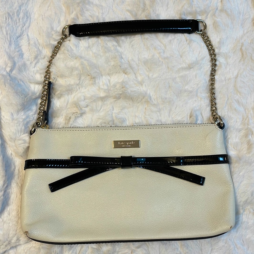 Kate Spade purse. Cream with black patent leather detail.